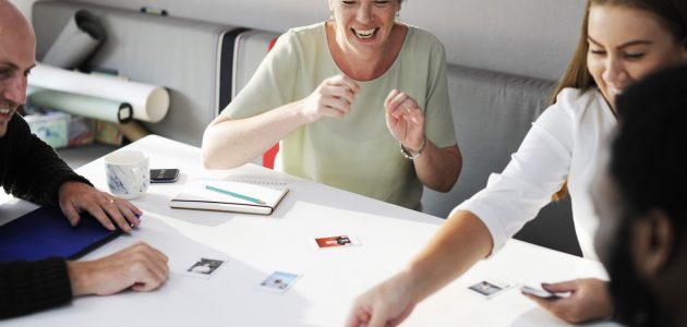 Smiling workers answering what is coworking?